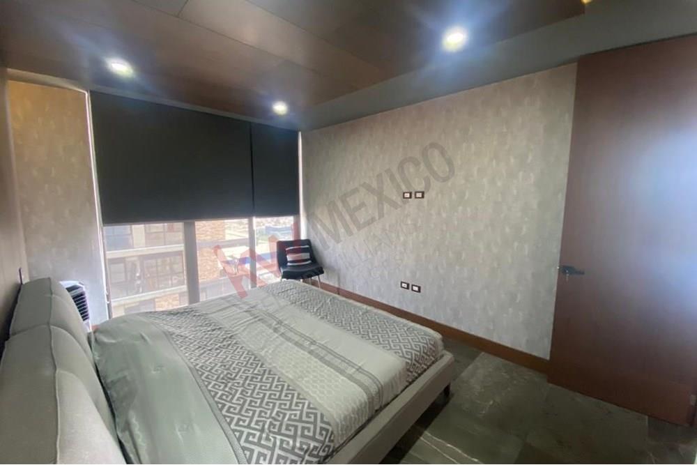 'Vistas Impresionantes y Comodidad en Lomas de Angelópolis: Departamento en Torre Grand Patio Baga'