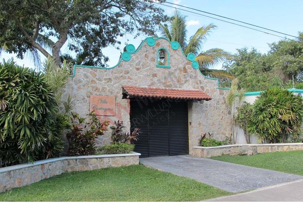 Un rincón paradisiaco a la entrada de la comisaría de Cholul, Yucatán