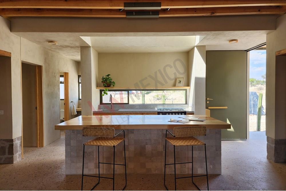Casa Mahis: Offering single-floor living with panoramic 360-degree views of the countryside.