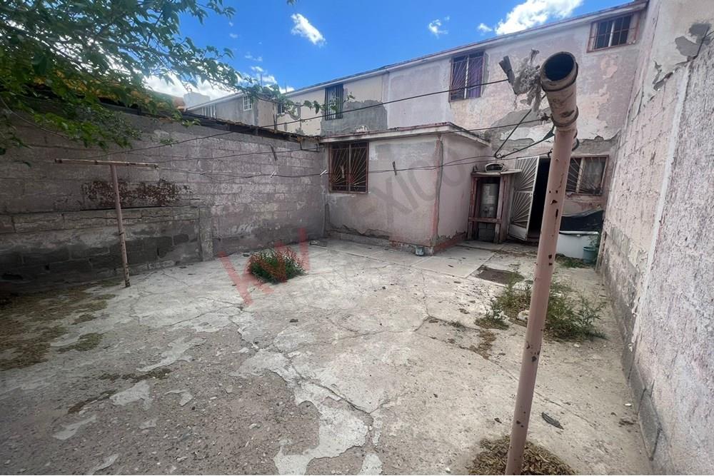 Casa con recamara en planta baja, en Infonavit Casas Grandes cerca de IMSS