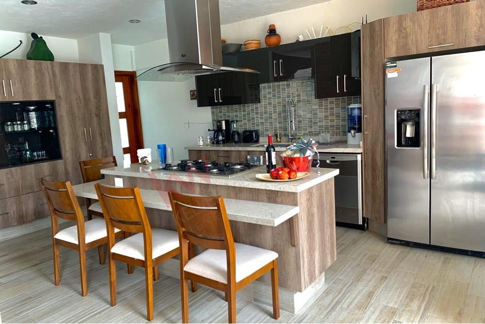 ¡Casa 'Lucia' con alberca privada y vista al campo de golf!