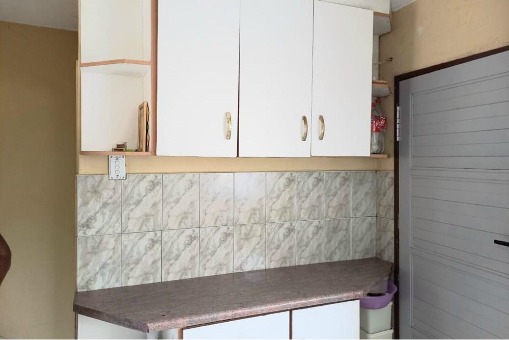 This Two Bedroom Double Storey House with a Double Storey Outbuilding