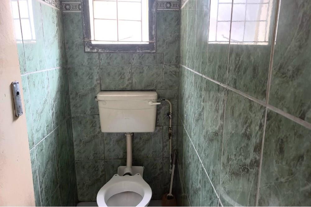 This Two Bedroom Double Storey House with a Double Storey Outbuilding