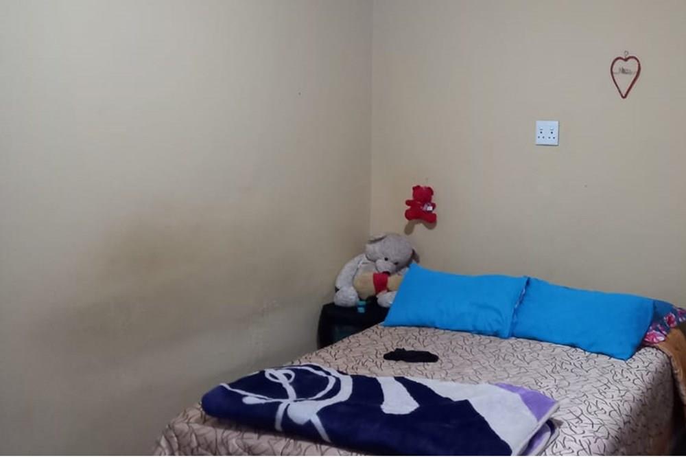 This Two Bedroom Double Storey House with a Double Storey Outbuilding